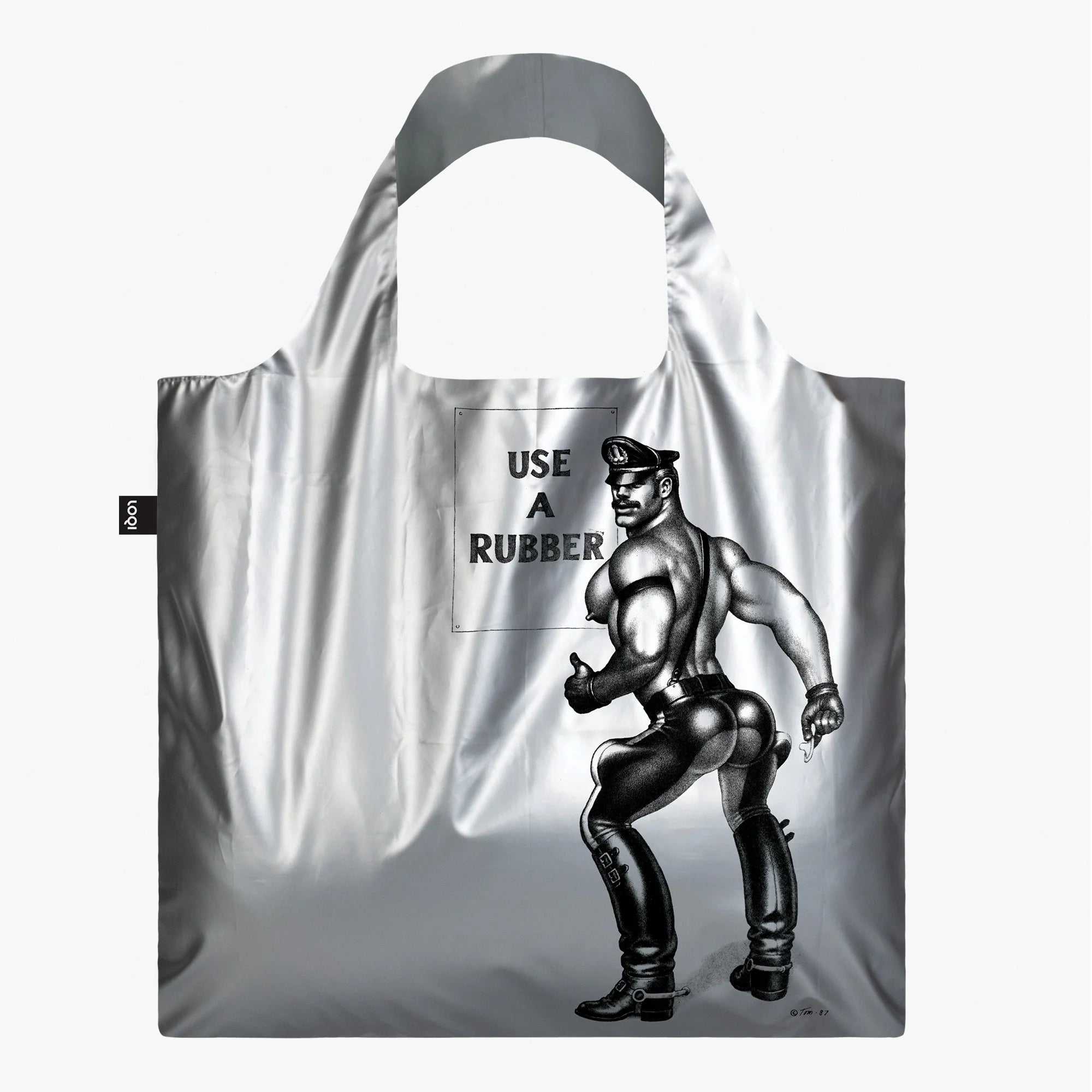 Srebrna torba podręczna TOM OF FINLAND z nadrukiem mężczyzny w skórzanym stroju od Yamann