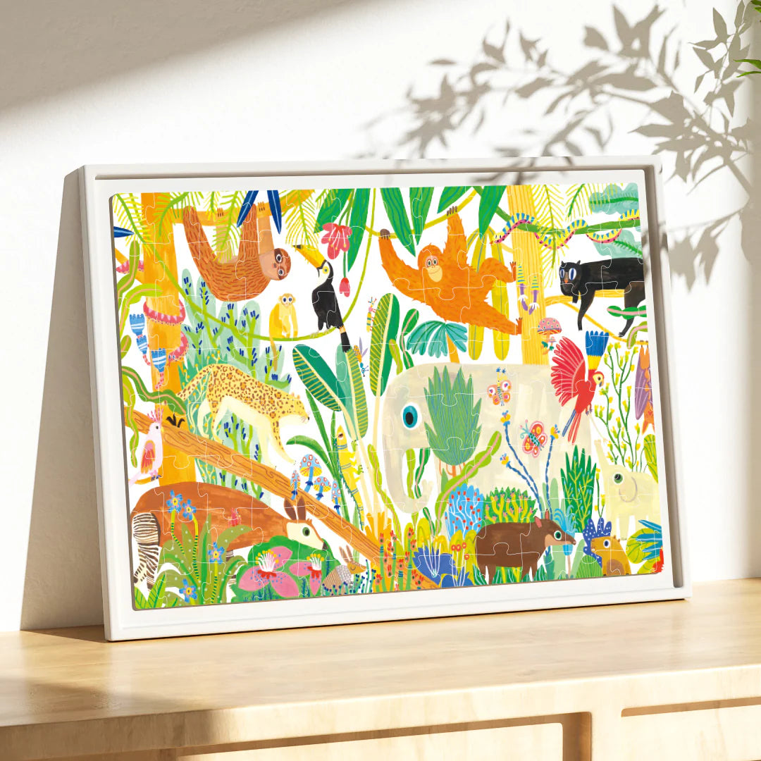 Rompecabezas artísticos maravillas del bosque mideer que representan animales y plantas coloridas en la jungla.