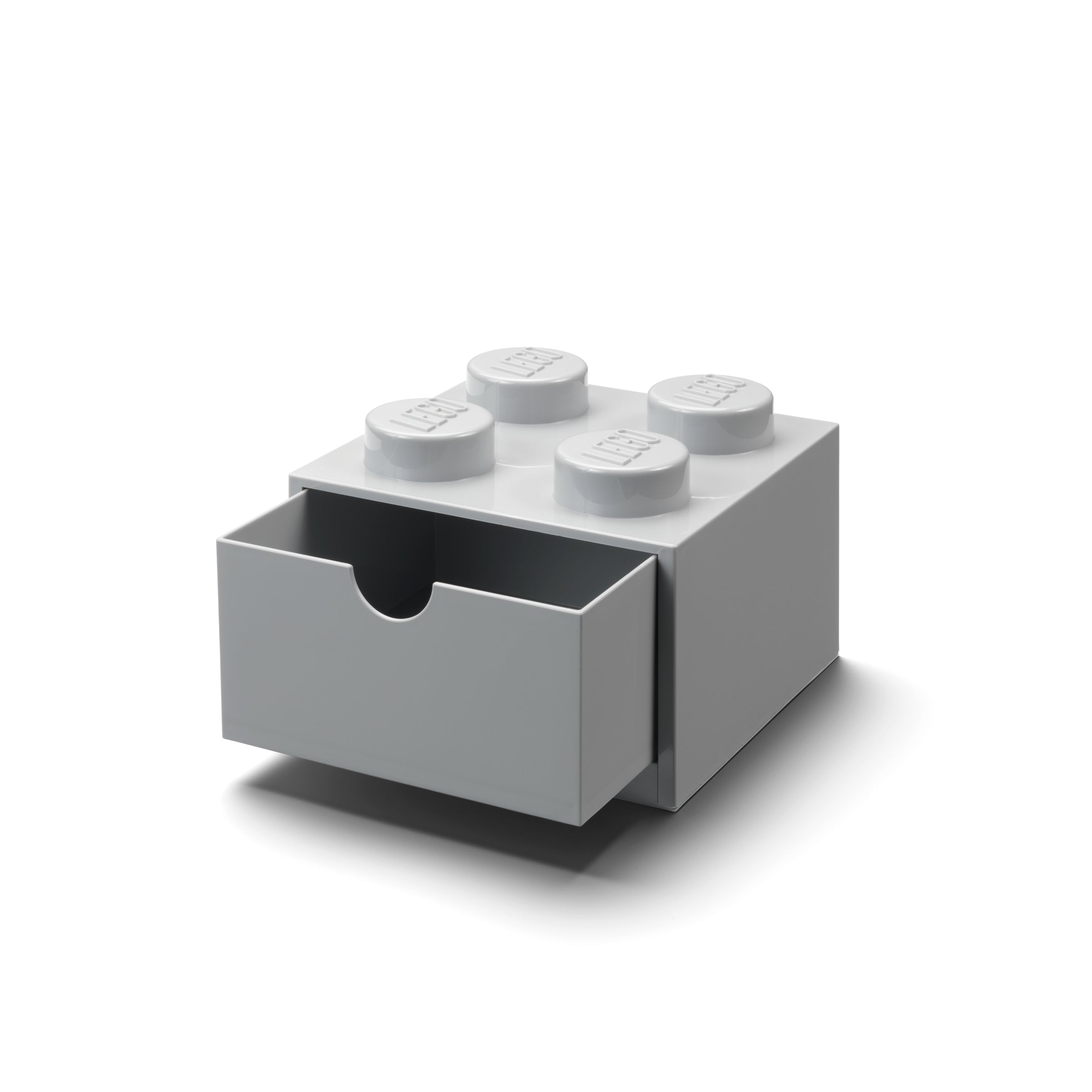 Szara szufladka na biurko LEGO w kształcie klocka z otwartą szufladą do przechowywania drobiazgów