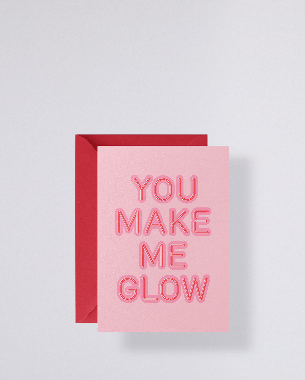 kartka okolicznościowa you make me glow różowa z czerwonym napisem i kopertą