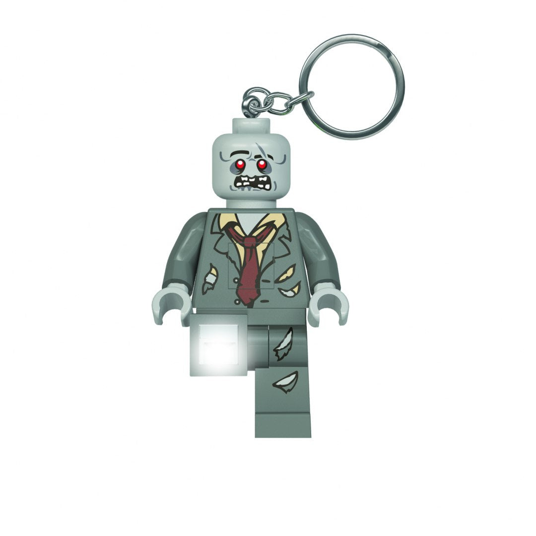 brelok z latarką LEGO przedstawiający figurkę zombie z czerwonymi oczami i świecącą latarką MOB
