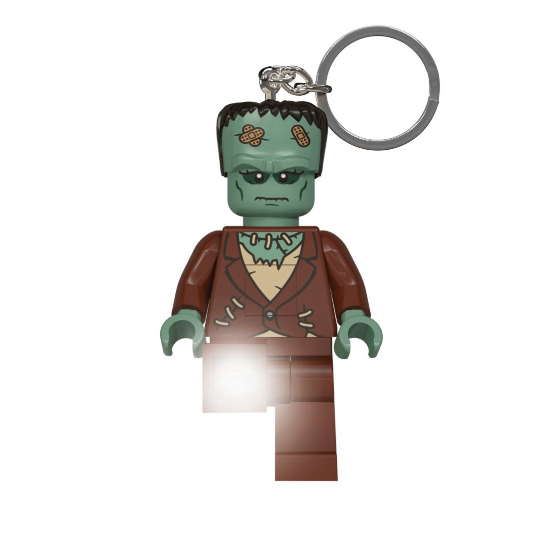 MOB brelok z latarką LEGO Frankenstein przedstawiający zieloną postać z latarką w nodze
