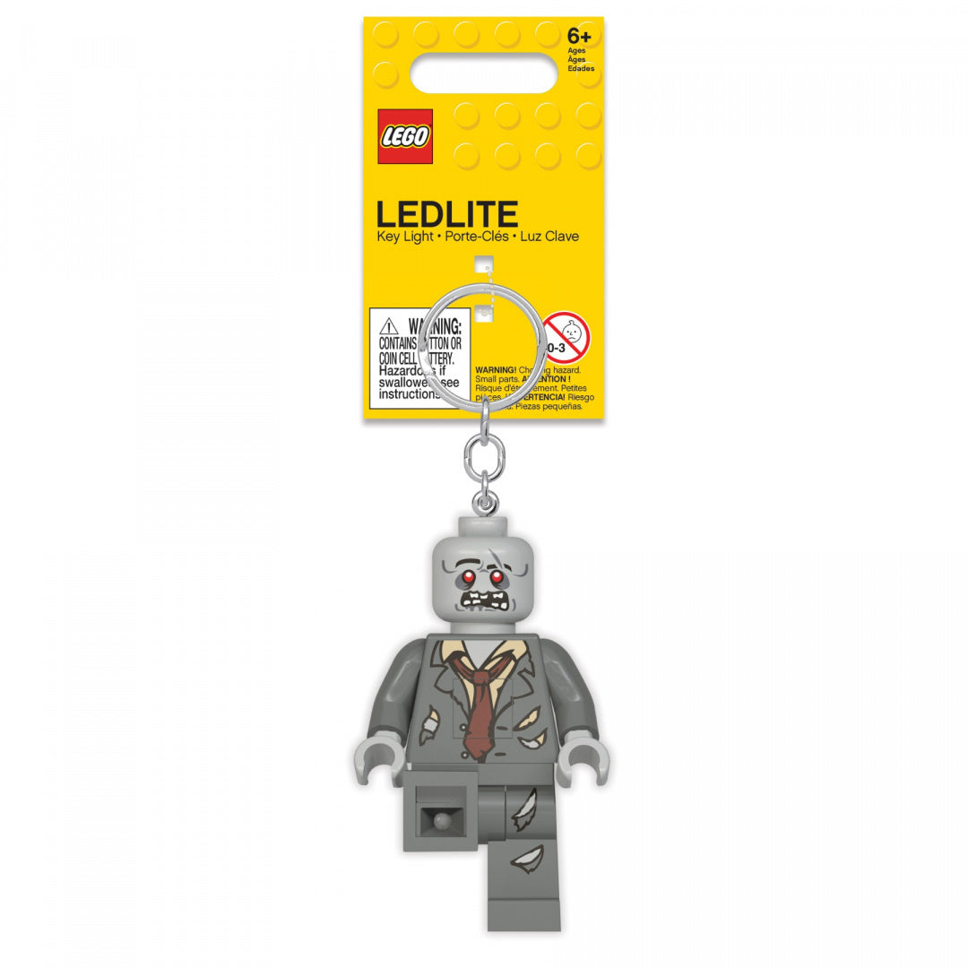 brelok z latarką LEGO postać zombie szara z czerwonymi oczami i żółtą metką
