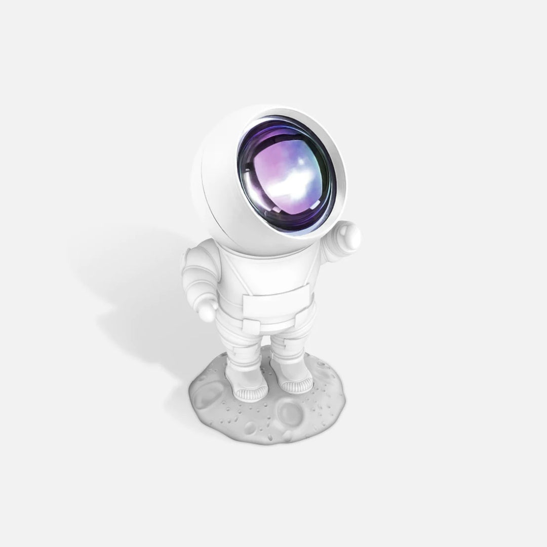 lampka projekcyjna astronauta stojąca na księżycowej powierzchni z fioletową soczewką BV JACOB COMPANY