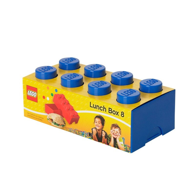 lunchbox LEGO niebieski w kształcie klocka z ośmioma niebieskimi wypustkami na żółtym opakowaniu