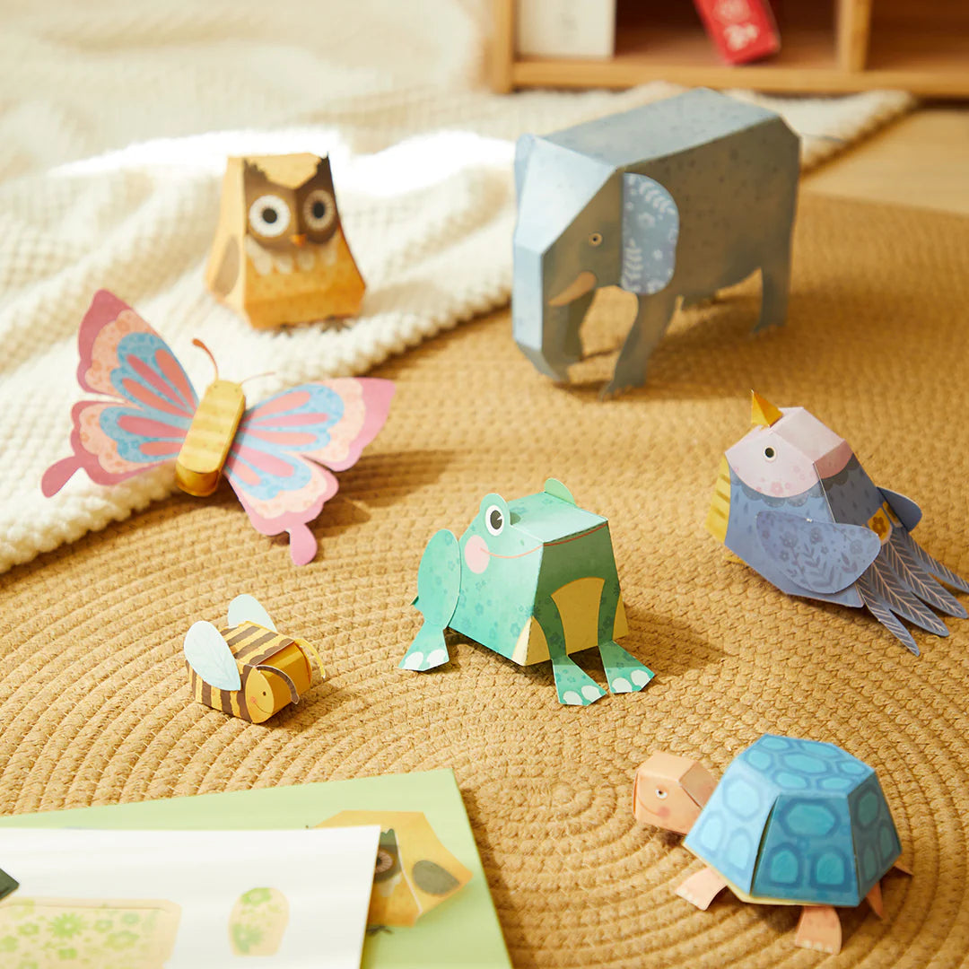 Zestaw origami papierowe zwierzęta Yamann z motylem, żabą, słoniem i sową na dywanie