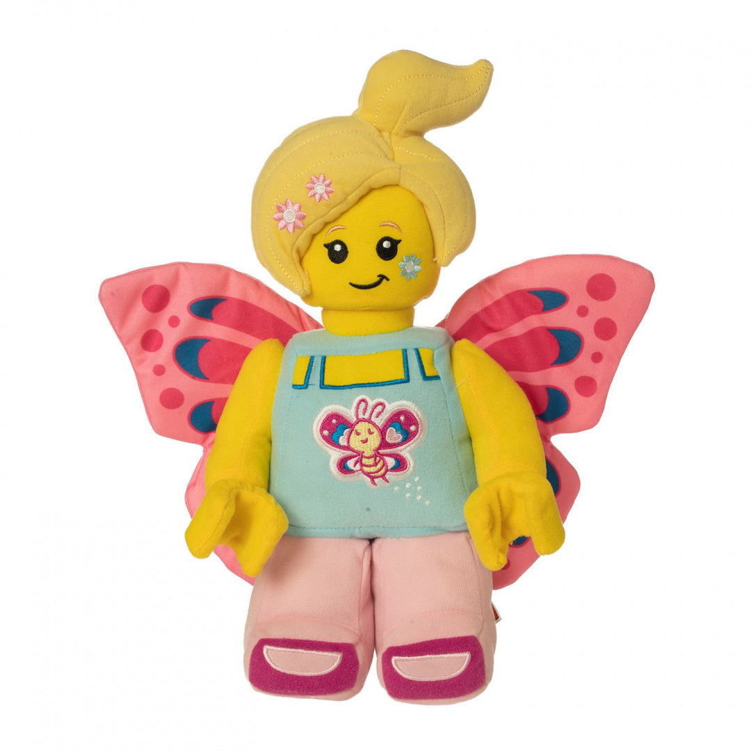 Pluszak LEGO Motylek z różowymi skrzydłami i żółtą głową ubrany w niebieski top i różowe spodnie