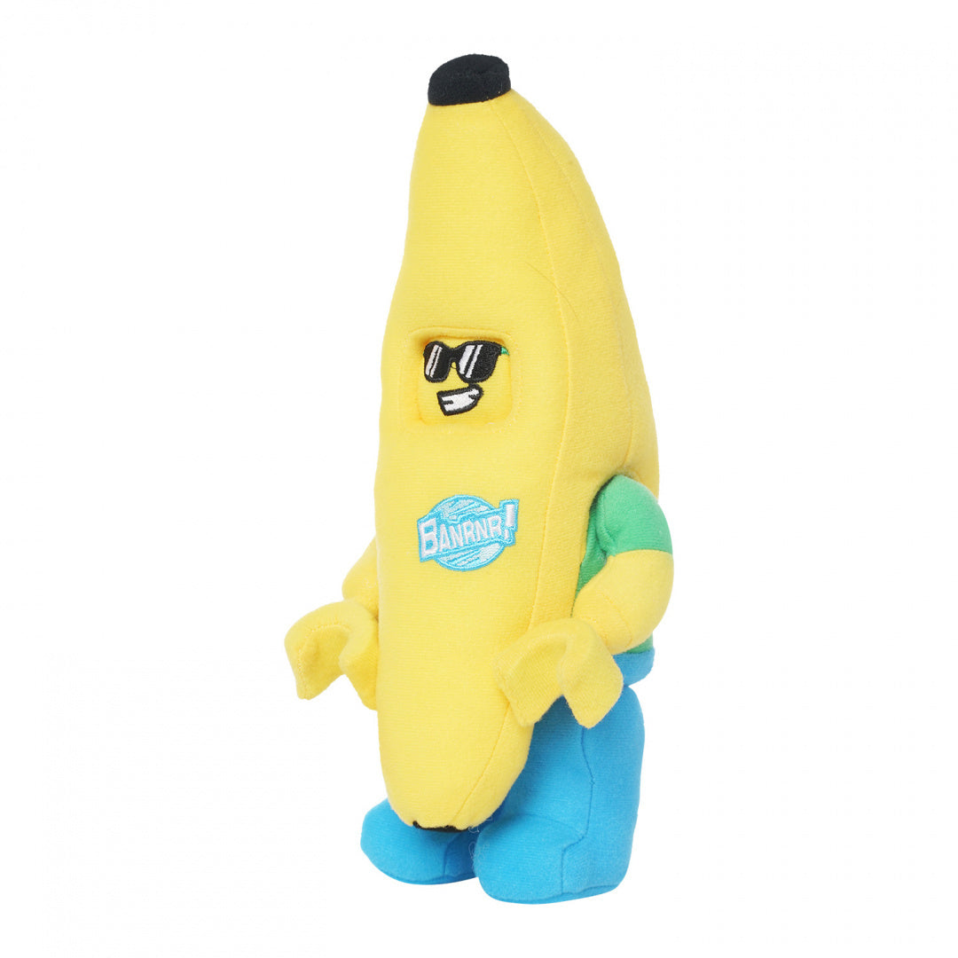 Pluszak LEGO banan w żółtym kostiumie z niebieskimi spodniami i poduszką w kształcie banana