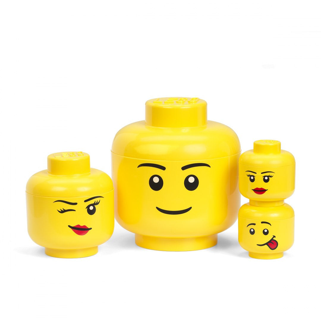 Pojemnik LEGO duża głowa chłopiec w żółtym kolorze z uśmiechniętą twarzą i innymi głowami LEGO