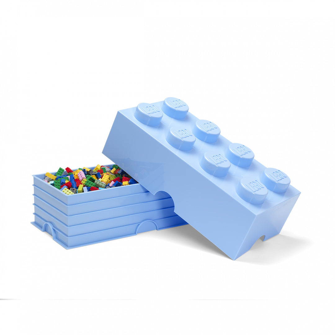 Niebieski pojemnik LEGO na zabawki w kształcie dużej klocka z kolorowymi klockami wewnątrz
