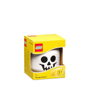 LEGO pojemnik na zabawki w kształcie białej czaszki w żółtym opakowaniu