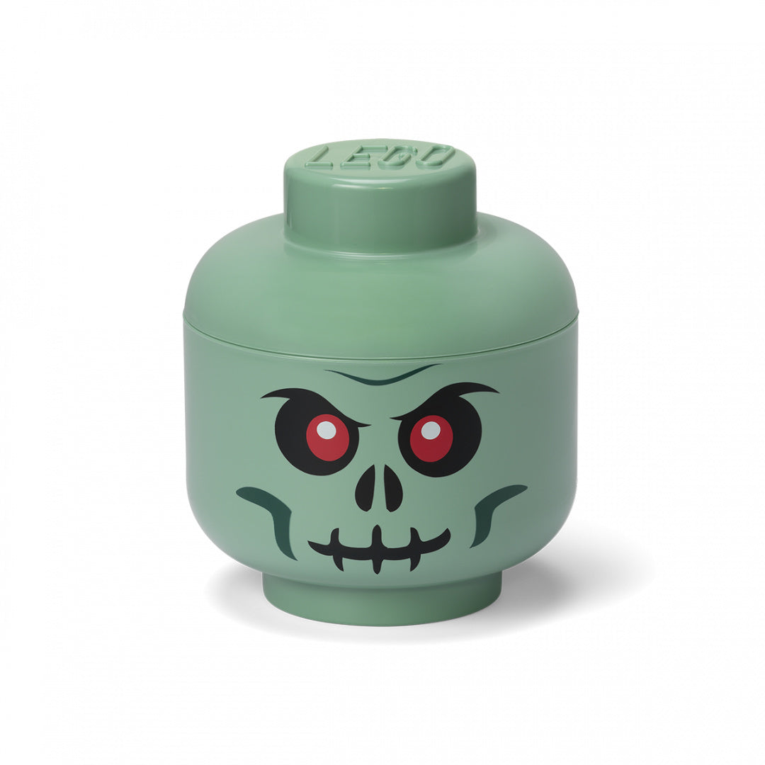 Zielony pojemnik LEGO zombie w kształcie głowy zombie z czerwonymi oczami i czarnymi detalami