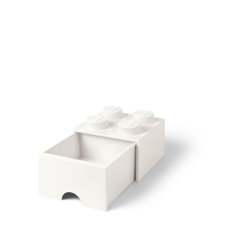 Biała szuflada LEGO na zabawki w kształcie klocka z otwartym frontem na białym tle