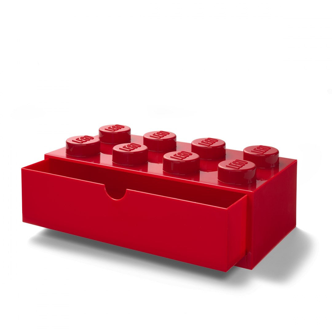 Czerwona szufladka LEGO na biurko przypominająca klasyczną klockową kostkę LEGO