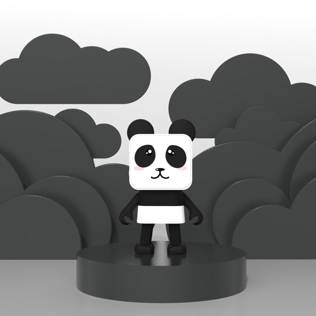Tańczący głośnik bezprzewodowy panda na czarnym podium w otoczeniu sylwetek chmur i drzew