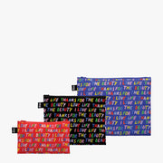 Das LOVE LIFE Set von Yamann mit bunten Drucken und Sprüchen auf den Täschchen
