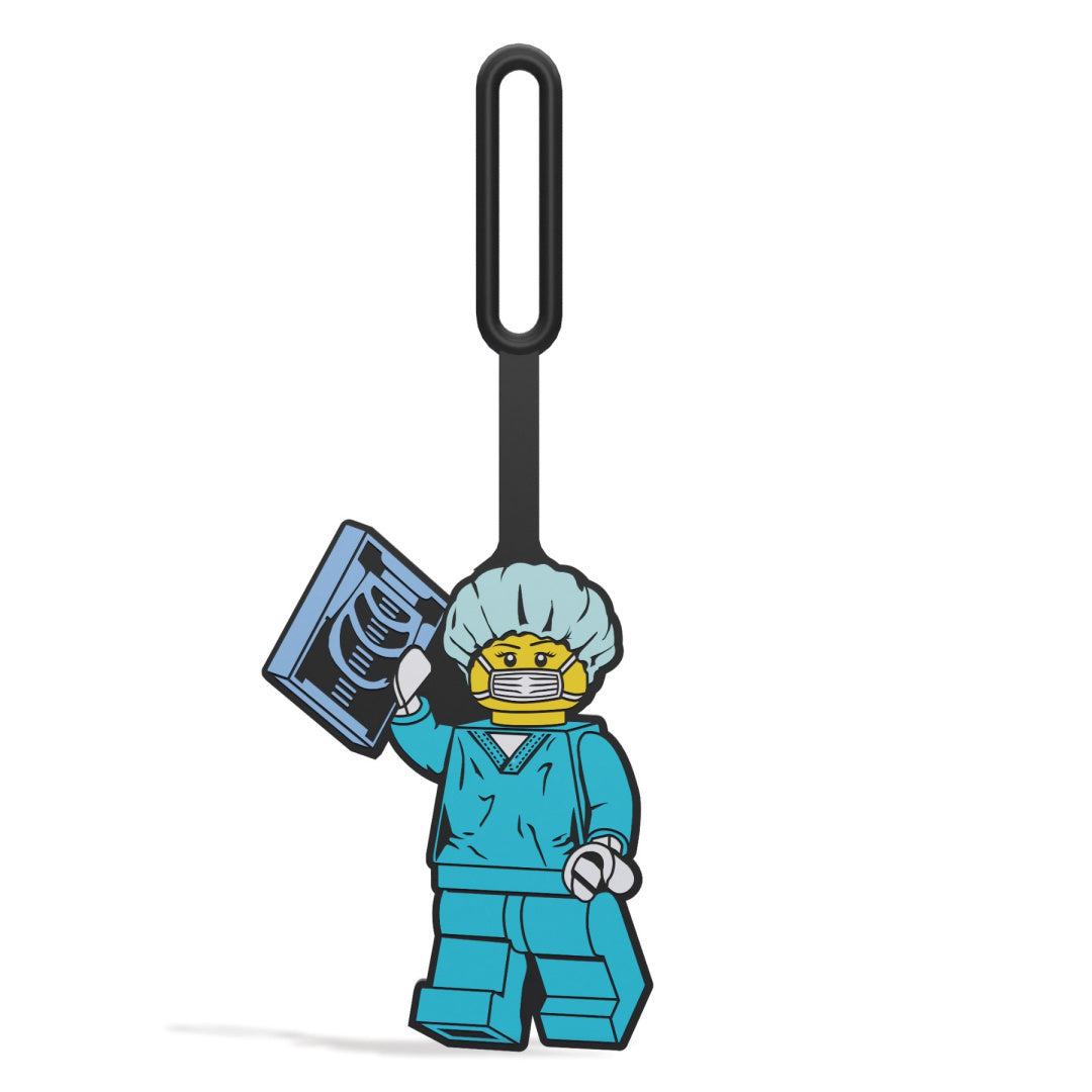 Zawieszka LEGO chirurg w niebieskim stroju medycznym z radiogramem i maską ochronną