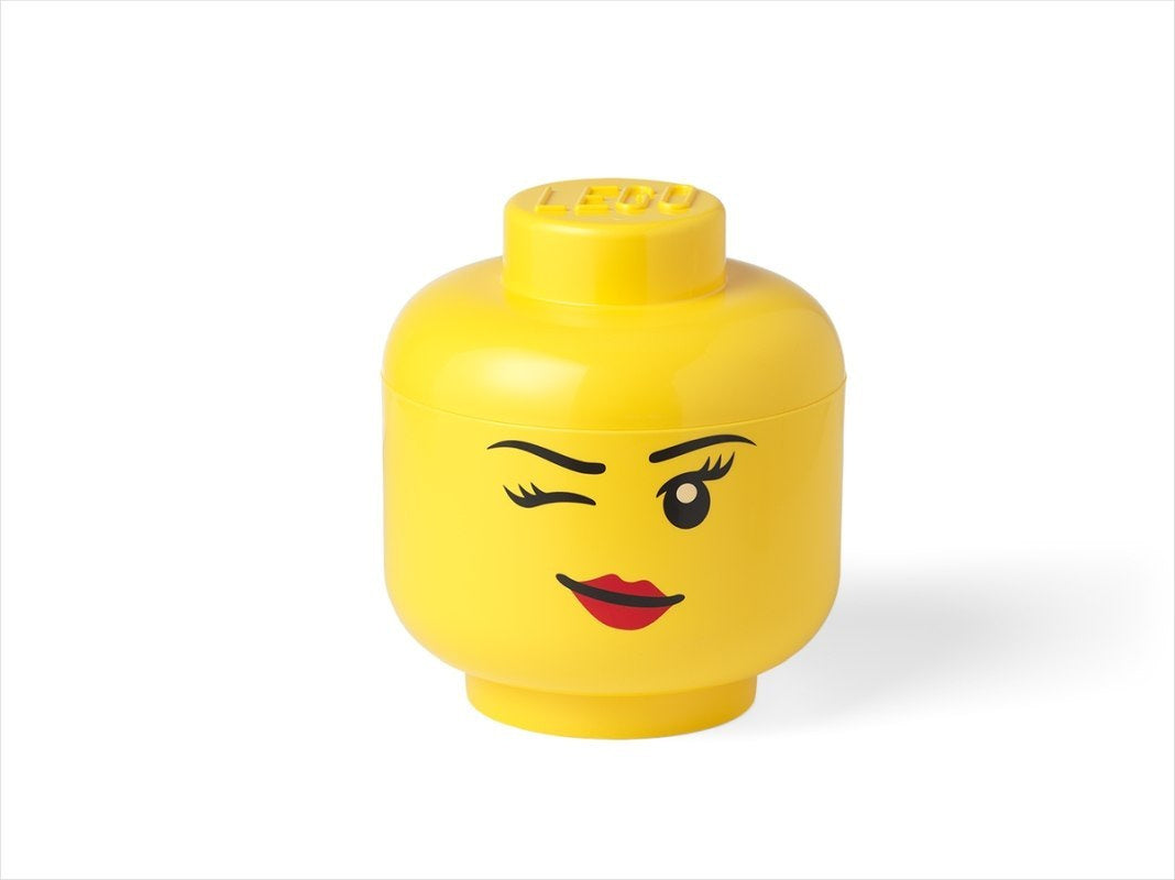 Pojemnik LEGO głowa dziewczynka w żółtym kolorze z uśmiechniętą twarzą i zamkniętym okiem