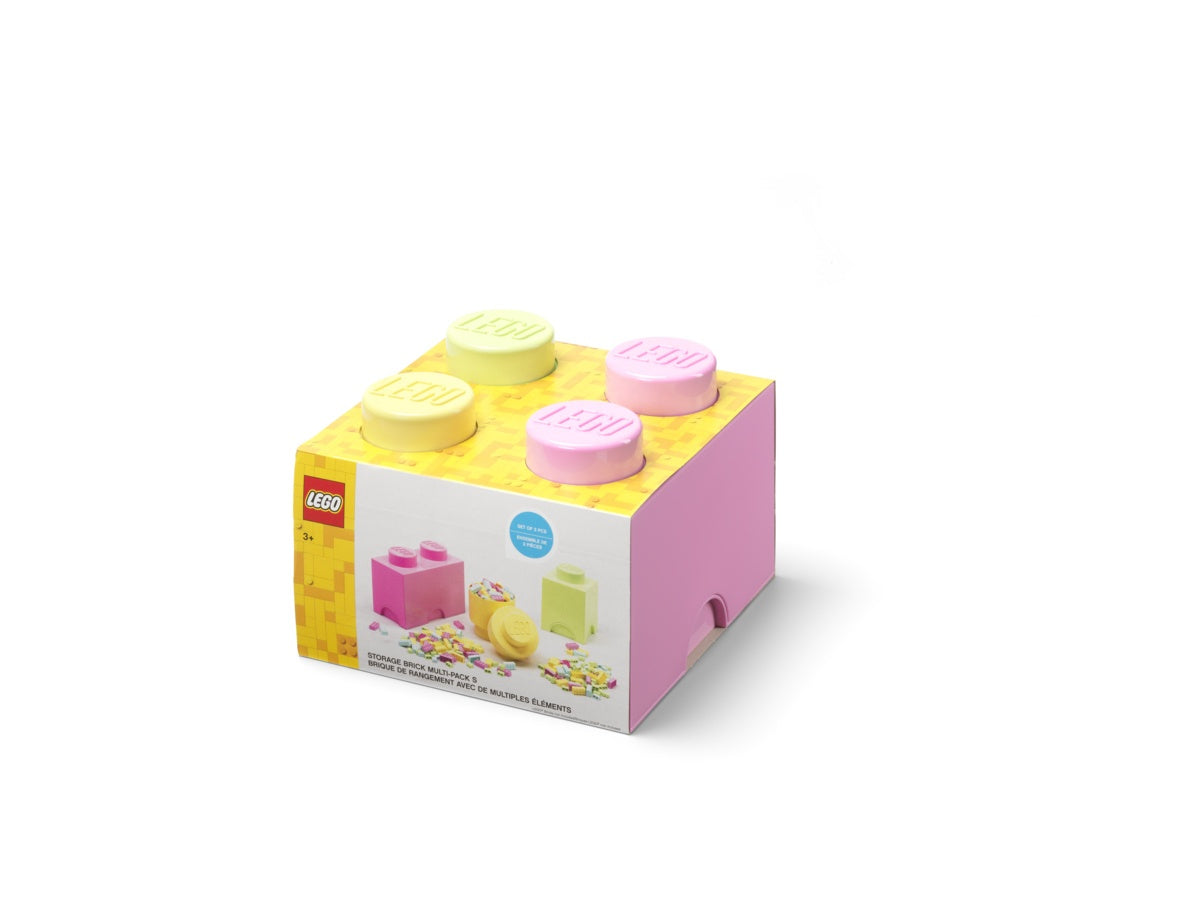Zestaw pastelowych pojemników LEGO w żółtym i różowym kolorze z czterema nakrętkami