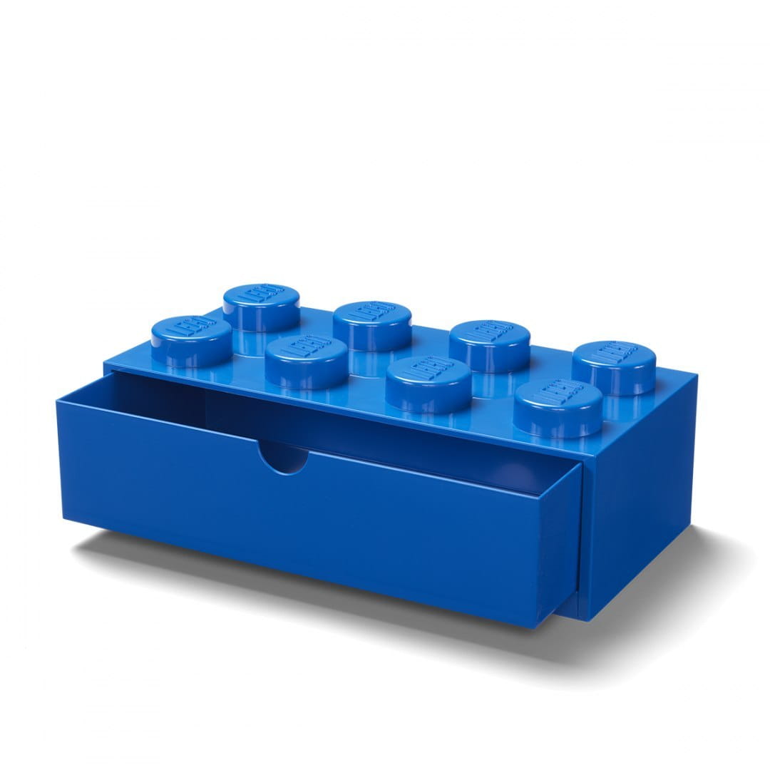 Niebieska szufladka LEGO na biurko w kształcie dużej cegiełki LEGO z otwartą szufladą